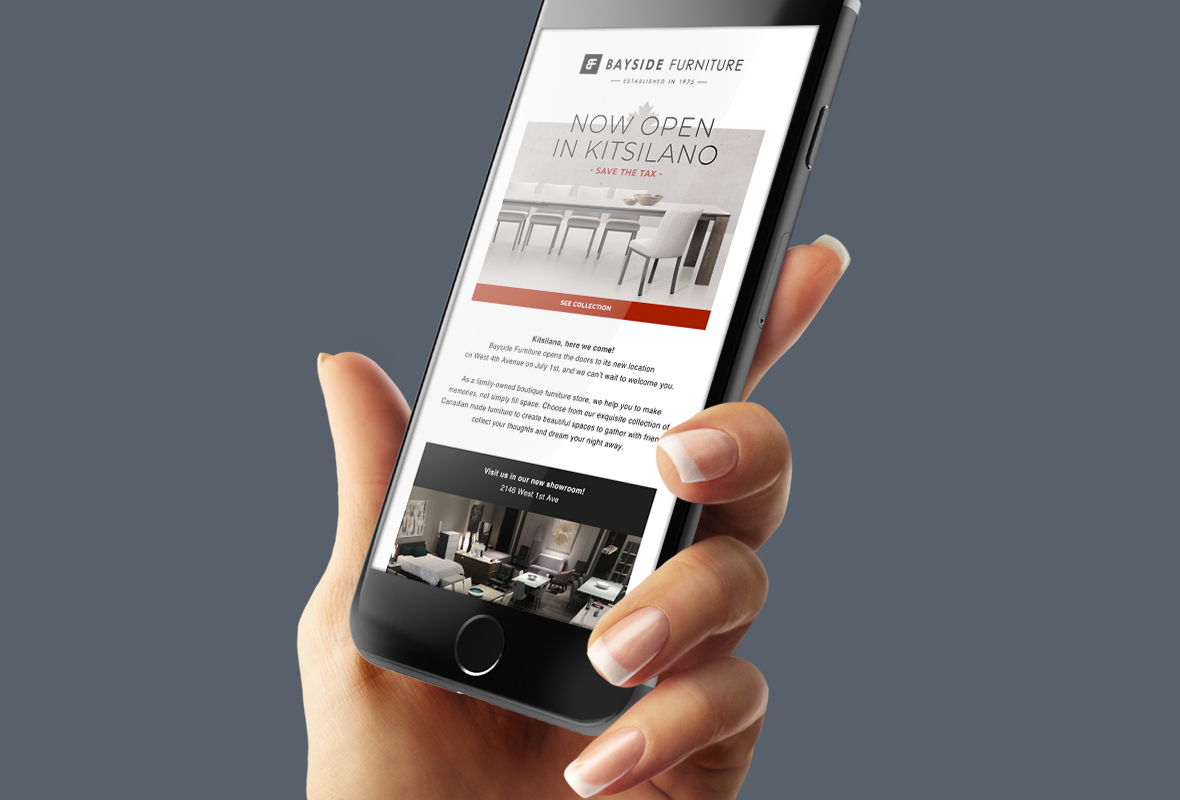  An iPhone screen renders a newsletter created by Exquison Marketing for a Vancouver furniture retailer.