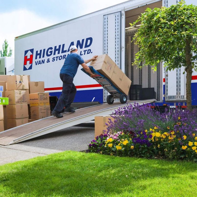 Mover loading truck - illustration for the highlights of the Highland Moving web design and digital marketing project.